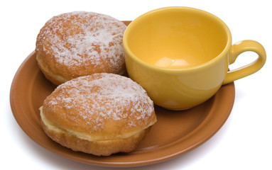 Two sweet buns and tea cup