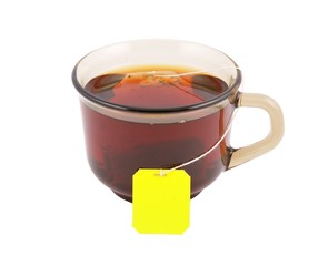 Glass cup of hot tea with tea bag isolated
