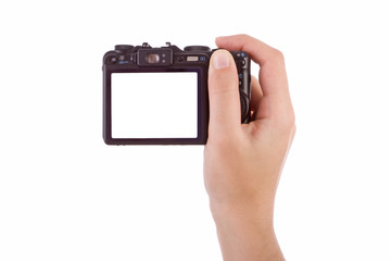 Hand photographing with a digital camera isolated on white.