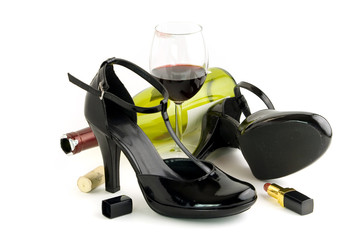 Shoes wine and lipstick on white background