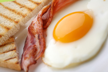Breakfast - toasts, eggs, bacon