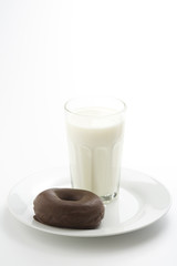 breakfast glass of chocolate milk and donut