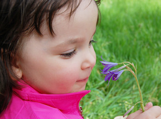 Little girl with flower