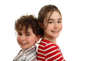 Portrait of two smiling kids isolated on white background