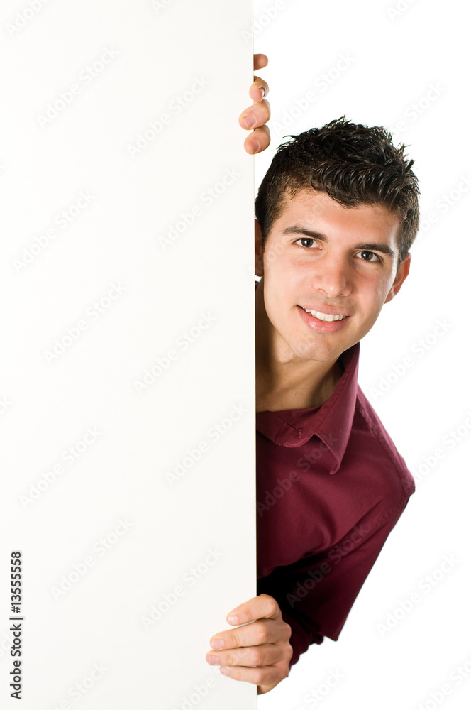 Wall mural young man with blank sign