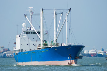 Naklejka premium Blue cargo ship