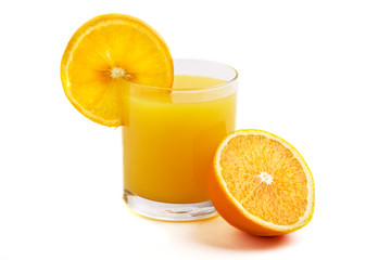 Glass of orange juice with orange