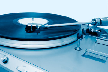 Turntable playing a vynil
