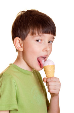 cute boy licking ice cream