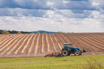 tractor plowing filed
