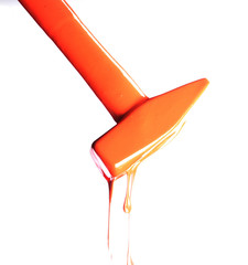 Hammer in a dense orange color liquid.