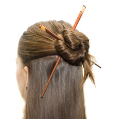 woman coiffure with asian sticks