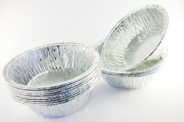 Stacks of small round catering trays