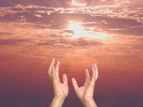 hands streaching out to sky as a symbol of people hope and sapir