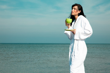 Young beauty feminine in white bath robe