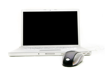 laptop and mouse over white, focus on mouse