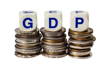 Stacks of coins with the word GDP isolated on white background