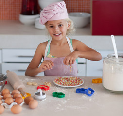 Beautiful young Girl Working in the Kitchen