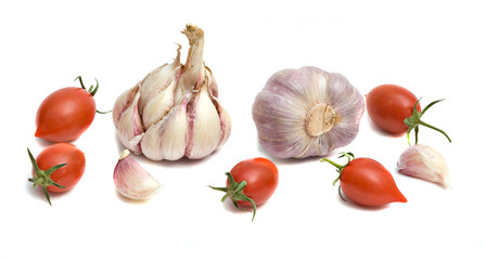 Tomatoes and garlic isolated on white bakground