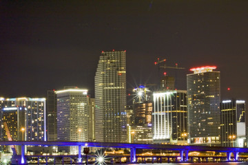 Fototapeta na wymiar Miami downtown night view of business buildings and bridge