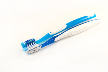 two toothbrushes on a white background