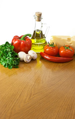 Empty table with ingredients  and place for your dish or pizza