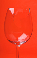 Close-up broken glass isolated on red