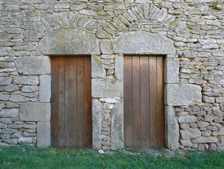 Wooden doors in a stone building