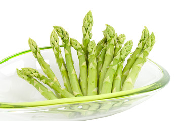 asparagus in bowl on white background