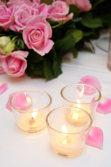 Pink roses and candles