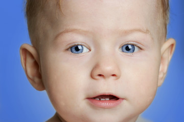 Cute baby girl with blue eyes