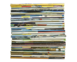 Heap of multi-coloured old magazines