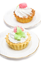 creamy cakes on a dishes