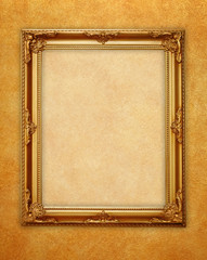 golden picture frame on wall