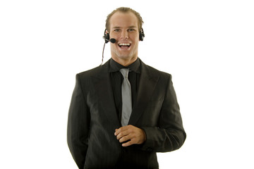 Successful young businessman wearing headphones