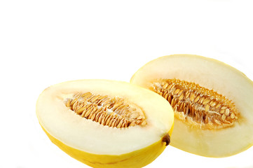 Cut melon isolated over white.