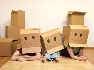 Smiley moving family - couple with a kid