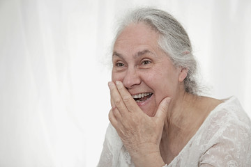 Elderly person laughing