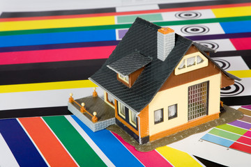 Colouring of the  house by a paint.