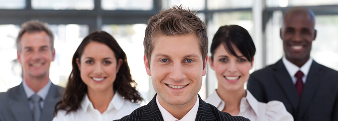 Portrait of a businessteam smiling at the camerea