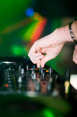 Deejay’s hand and turntable