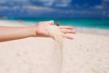 Fototapeta na wymiar Sand in hand