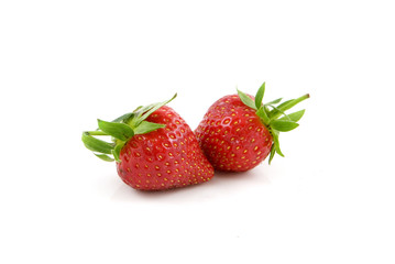 Two fresh and tasty strawberries.
