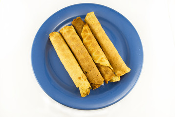 wafer tube on a plate on a white background