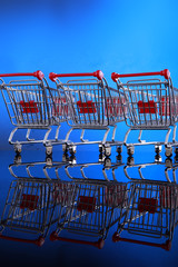 Miniature grocery shopping carts for business presentation