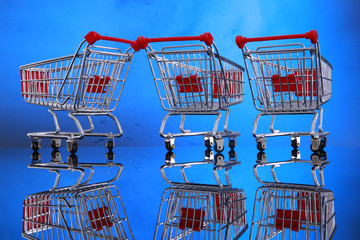 Miniature grocery shopping carts for business presentation