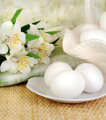 Fresh Eggs With White Flowers