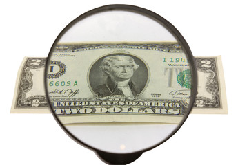 two dollars and magnifying glass