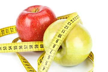 Apple and  measuring tape