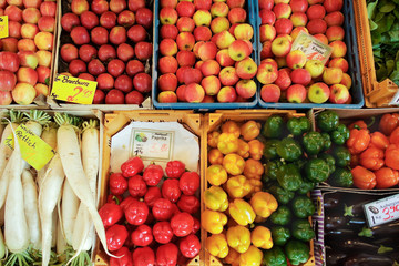 variety of fruits and vegetables at the market stall